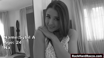 Busty brunette fingers her wet pussy while getting filmed