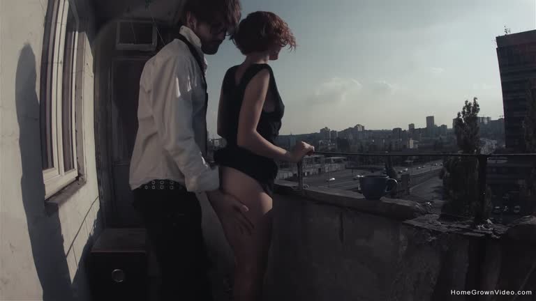 Redhead Has Her Morning Coffee And Sex On The Balcony