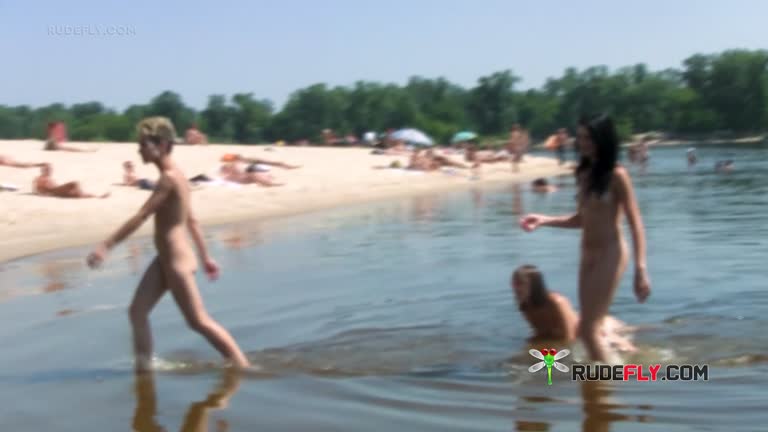 Curvaceous Nudist Teens Strolls Around  On The Beach And Enjoys A Sunny Day
