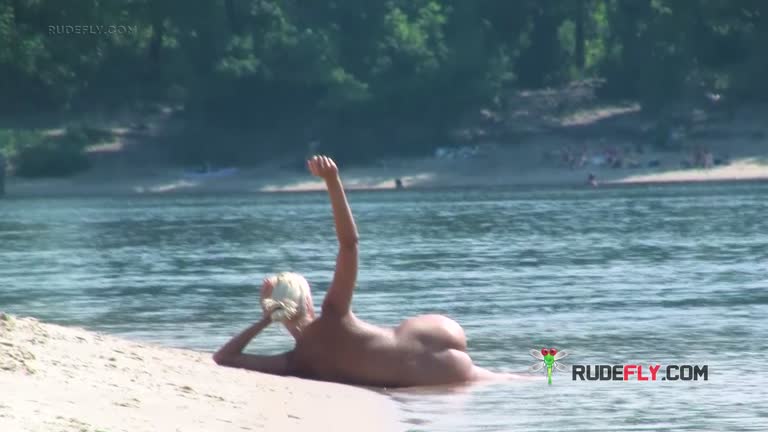 Playful Blond Nudist Teen Caught On Camera Naked At The Beach