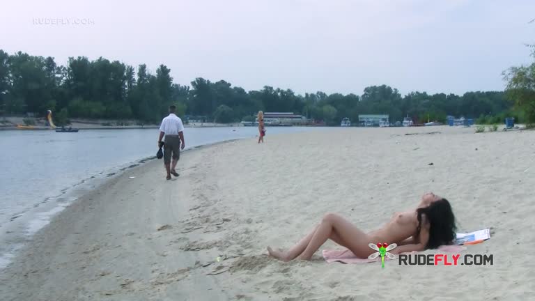 Ravishing Nude Beach Girl Caught On A Hidden Camera Sunbathing Outdoors